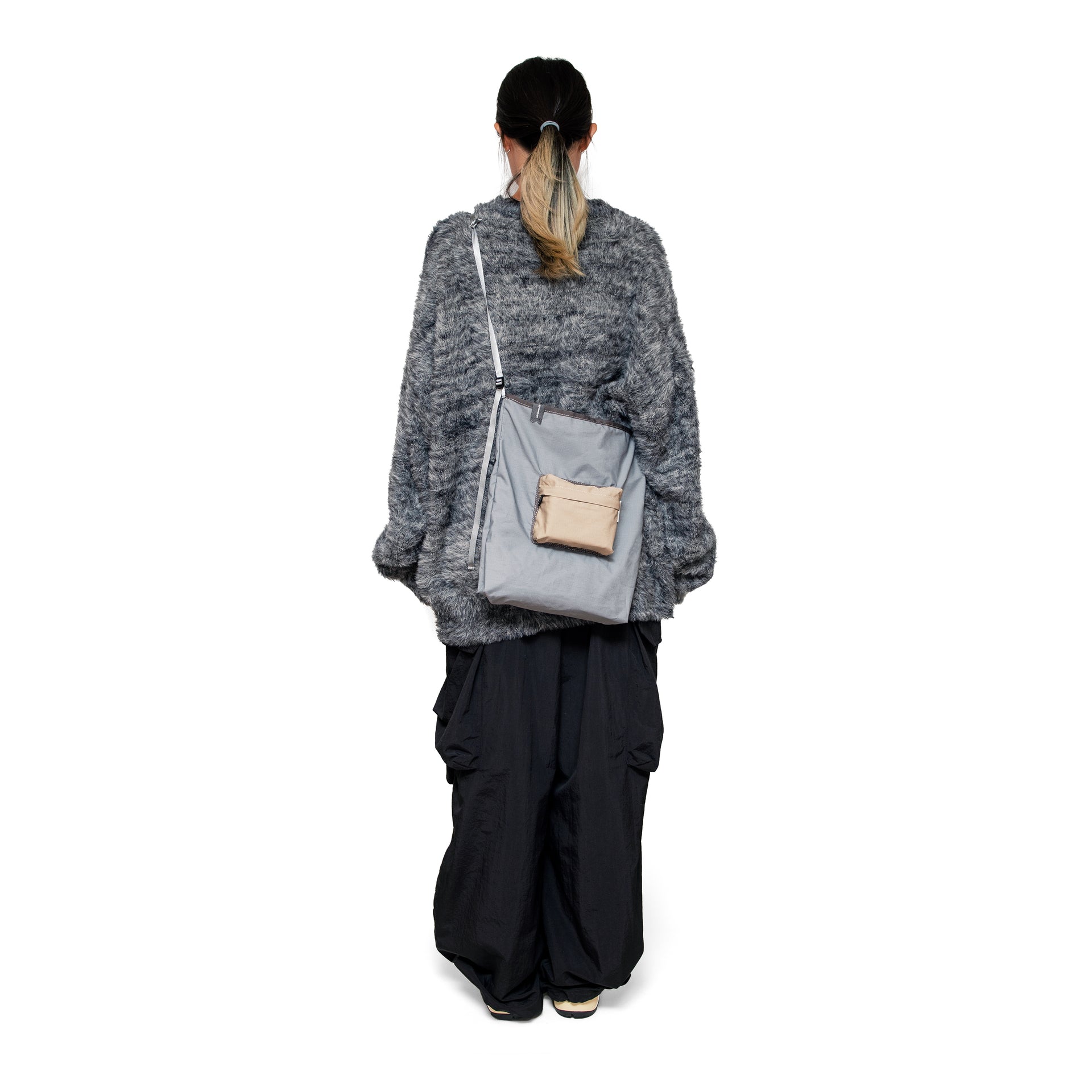 Teflon™ packable shoulder bag in stone