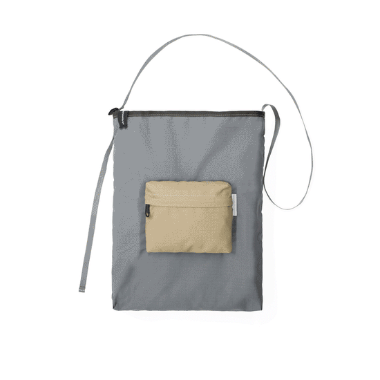 Teflon™ packable shoulder bag in stone