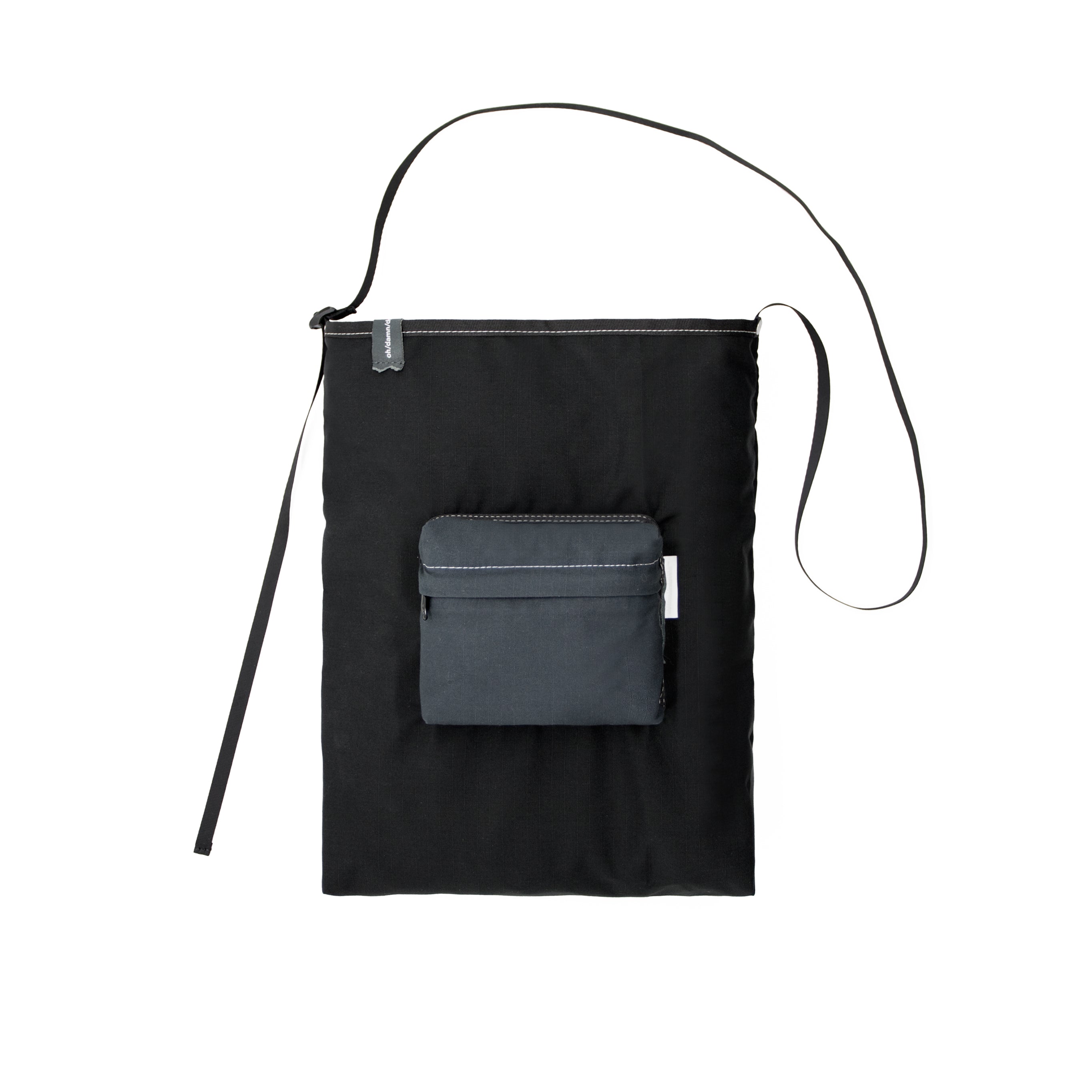 Teflon™ packable shoulder bag in shadow • oh/damn/design/shit