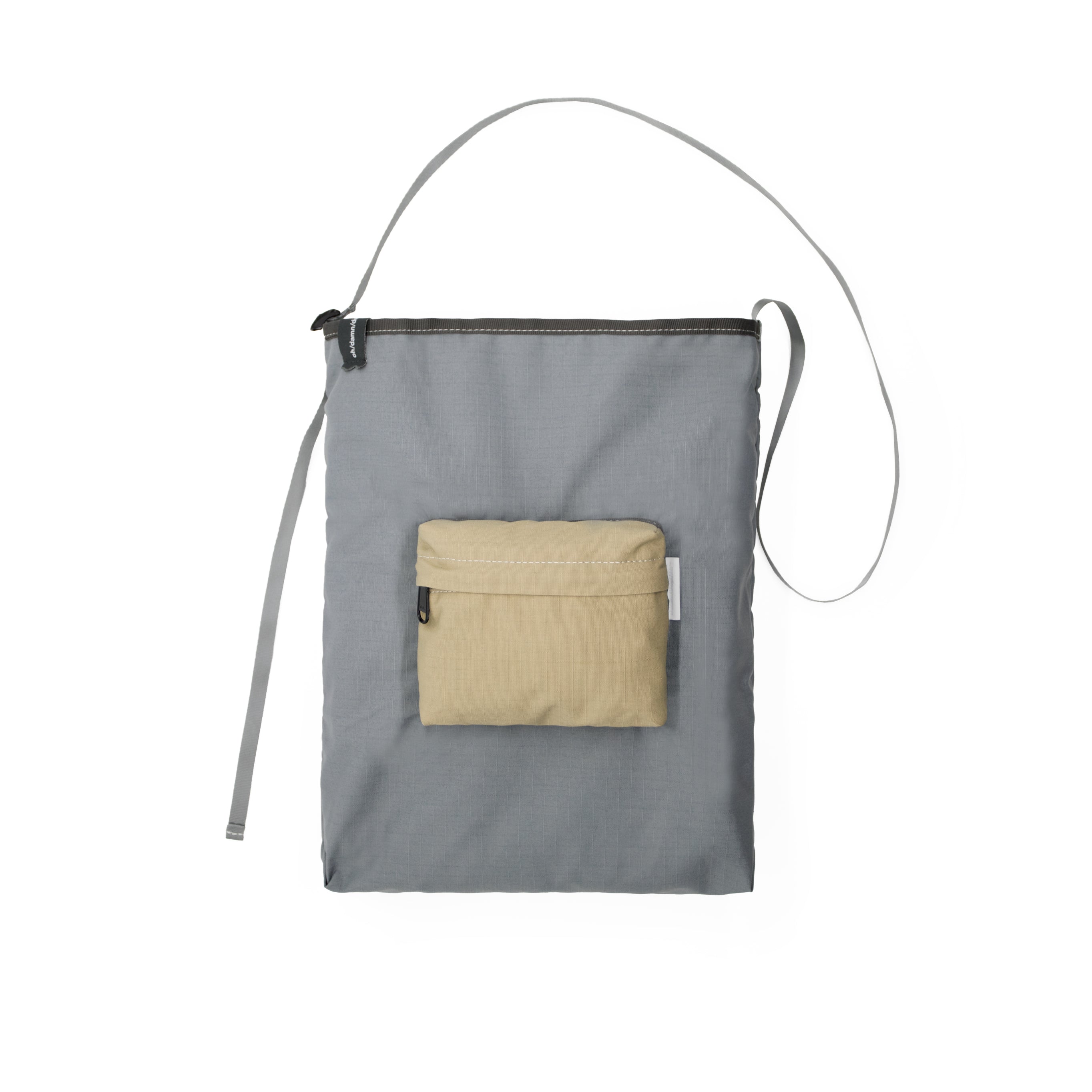 Teflon™ packable shoulder bag in stone • oh/damn/design/shit
