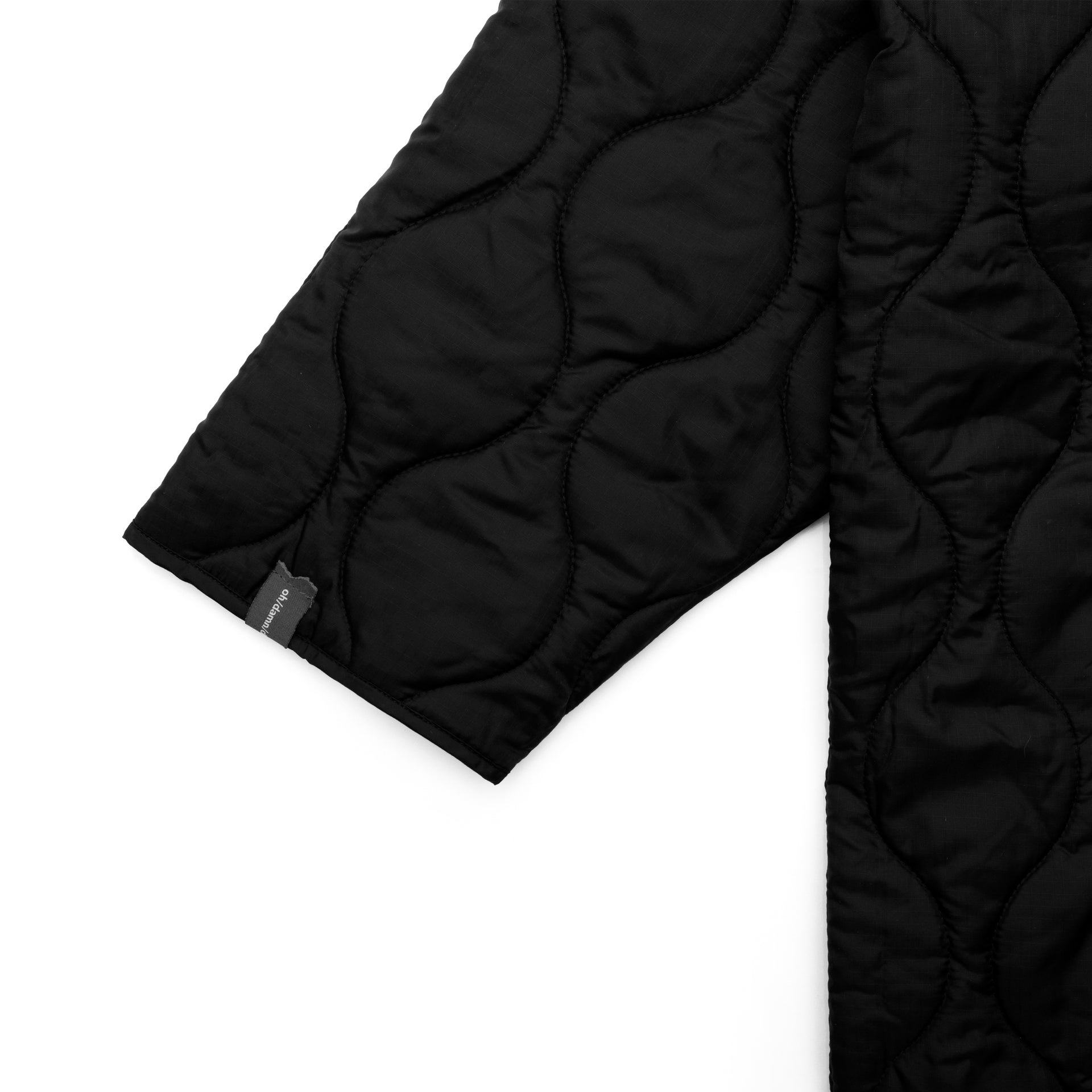 reversible quilting long jacket in black/black